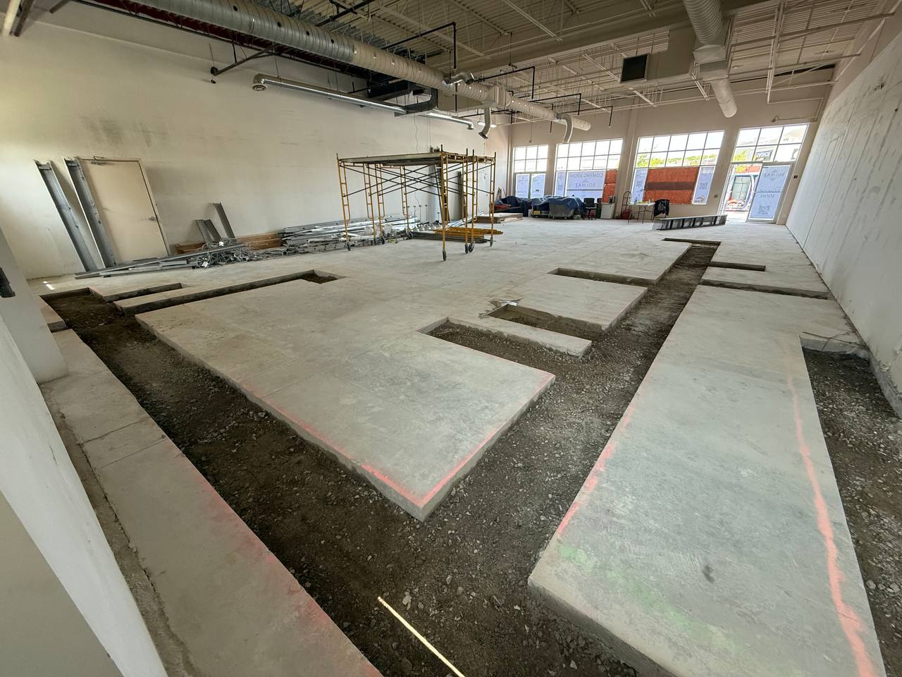 cutting concrete slab trenches for plumbing